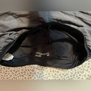 Under amour running shorts.size small. A dark grey color.